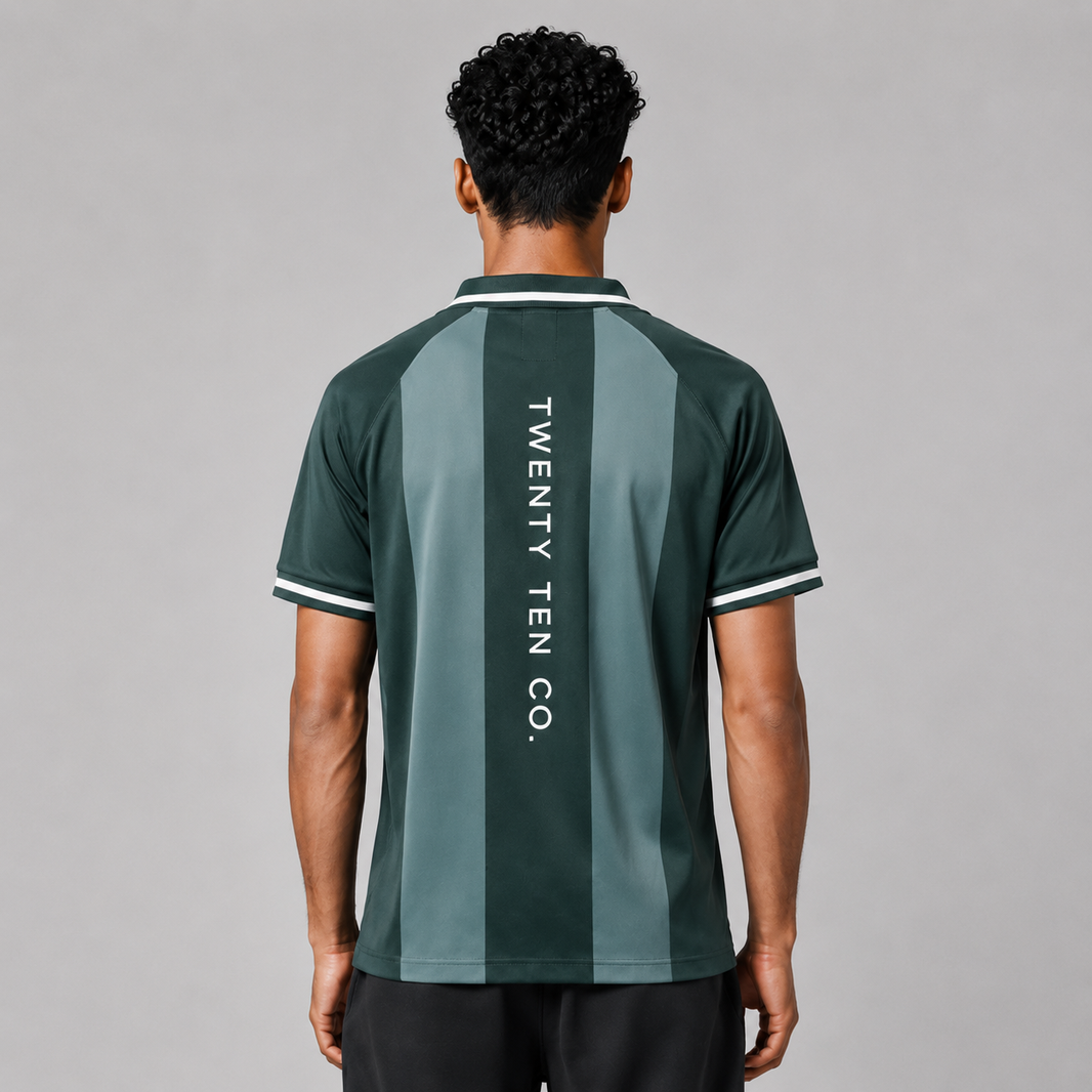 Person wearing a green sports jersey with 'TWENTY TEN CO.' branding on the back against a gray background