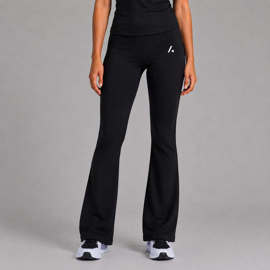 TwentyTenCollective black flared leggings made from recycled polyester and elastane, featuring a hidden waistband pocket.