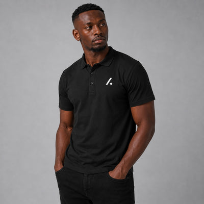 TwentyTenCollective black short sleeve polo shirt with white logo on chest and ribbed collar.