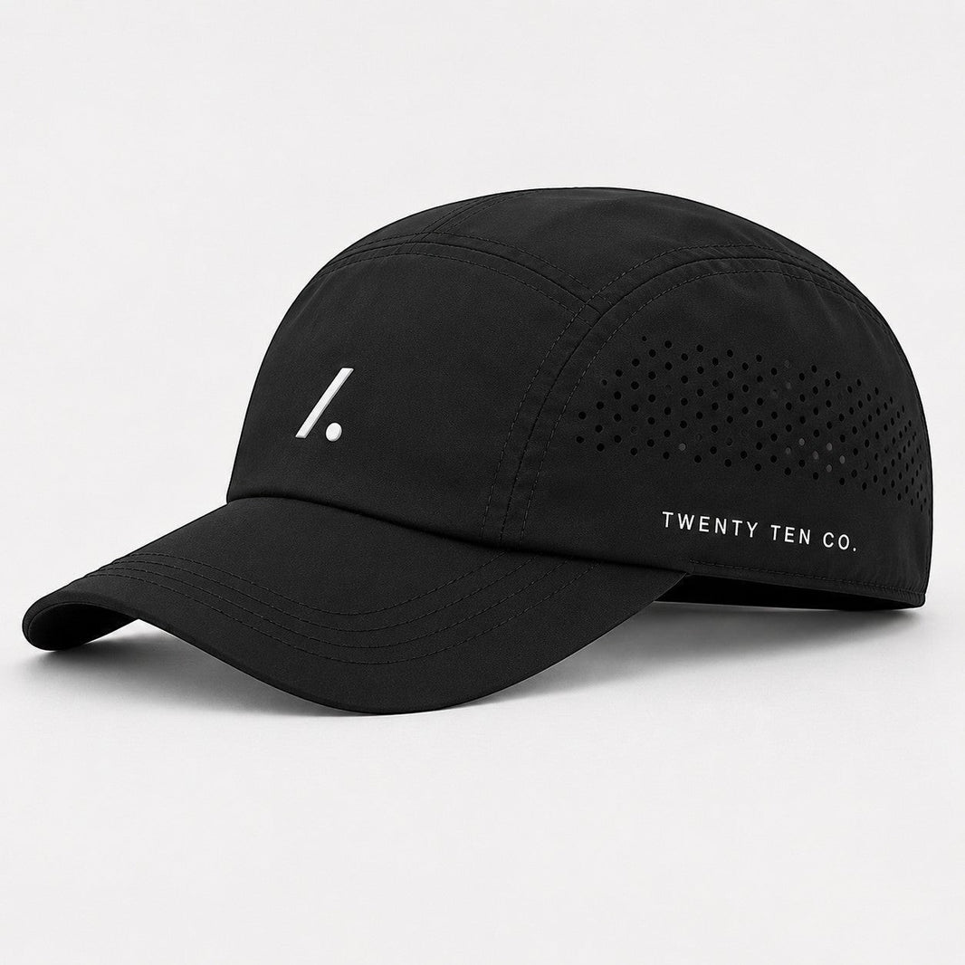 TwentyTenCo black performance baseball cap with white logo and perforated sides for ventilation.