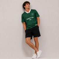 Twenty Ten Co. Athletic Jersey in green with white collar and branding. Lightweight, breathable fabric.