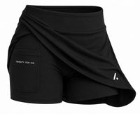 TwentyTenCollective black athletic skort with built-in shorts and pocket detail.
