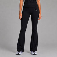 TwentyTenCollective black flared leggings made from recycled polyester and elastane, featuring a hidden waistband pocket.