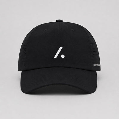 TwentyTenCollective black performance baseball cap with white logo and perforated sides for ventilation.