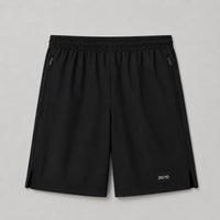 TwentyTenCollective black performance athletic shorts with elastic waistband, zippered pockets, and side vents.