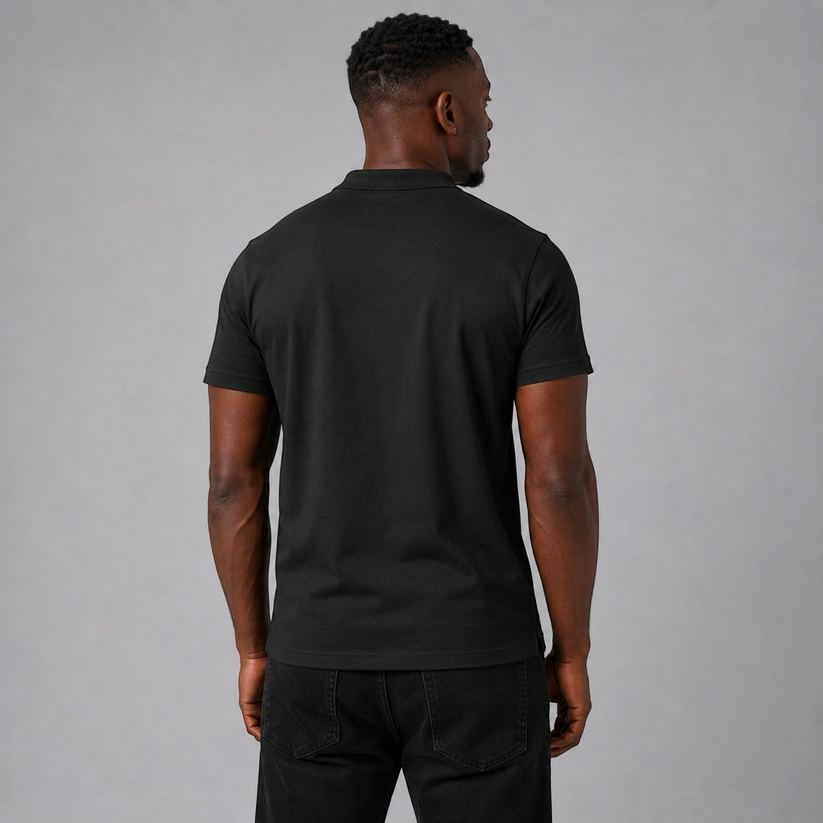 TwentyTenCollective men's black short sleeve polo shirt with ribbed collar and white embroidered logo on chest.