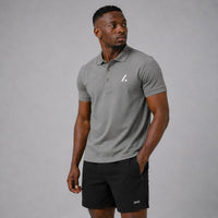 TwentyTenCollective Men's grey performance short sleeve polo shirt with white logo detail and classic collar.