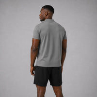 TwentyTenCollective men's grey performance short sleeve polo shirt with classic collar and subtle white logo.