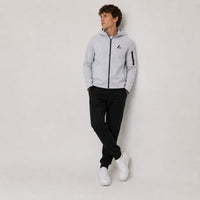 TwentyTenCollective light grey tech fleece full zip hoodie with black logo and zippered sleeve pocket.