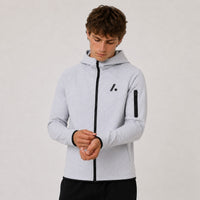 TwentyTenCollective light grey tech fleece full zip hoodie with black logo and zippered sleeve pocket.