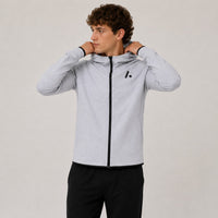 TwentyTenCollective light grey tech fleece full zip hoodie with black logo on chest and black trim.
