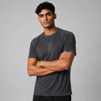 TwentyTenCollective Men's grey athletic t-shirt with raglan sleeves and tonal chest logo. Lightweight, breathable fabric.