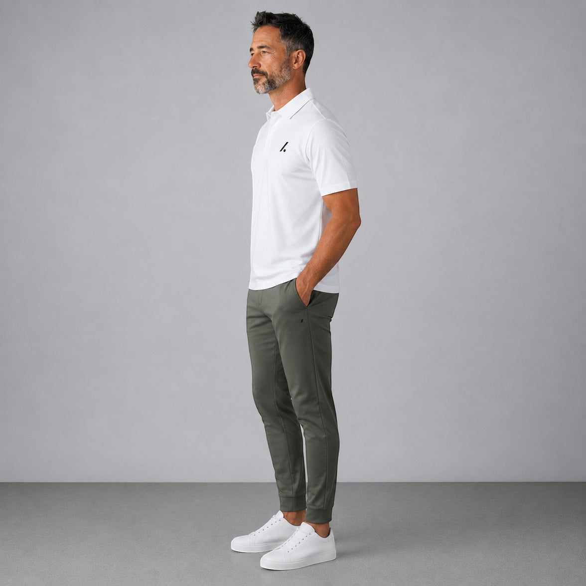 TwentyTenCollective Men's white performance polo shirt and olive green jogger pants set with a tapered fit.