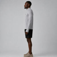 TwentyTenCollective men's light grey quarter zip long sleeve athletic shirt with black shorts