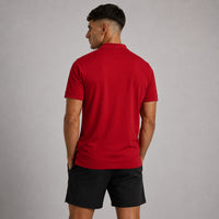 TwentyTenCollective men's short sleeve red performance polo shirt with embroidered logo on chest.