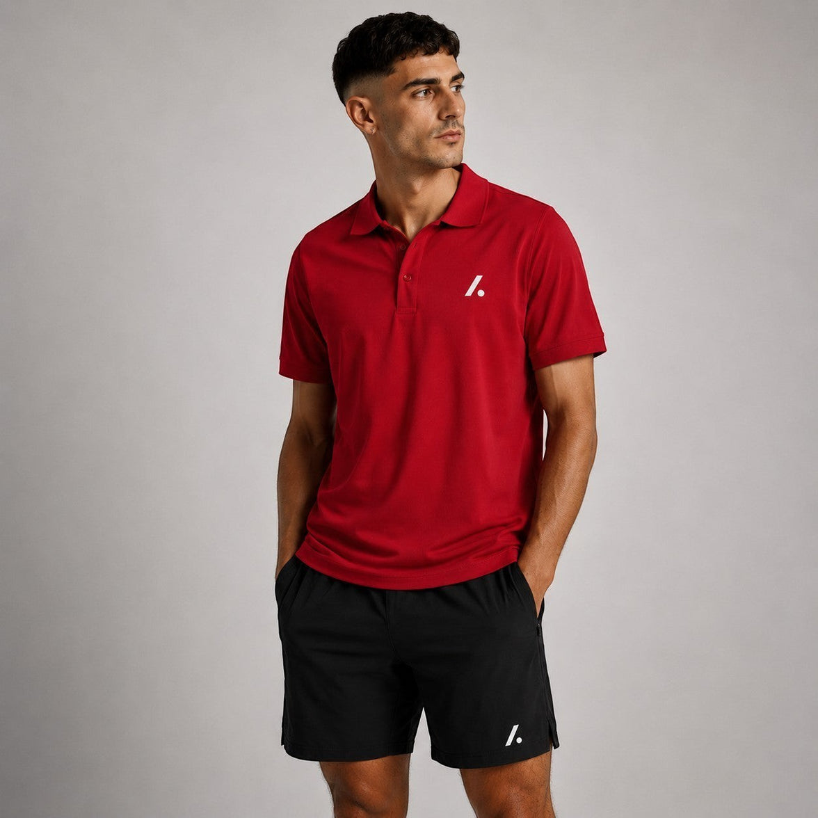 TwentyTenCollective men's short sleeve red performance polo shirt with embroidered logo on chest.