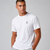 TwentyTenCollective white athletic performance t-shirt with crew neck, short raglan sleeves, and subtle logo detail.