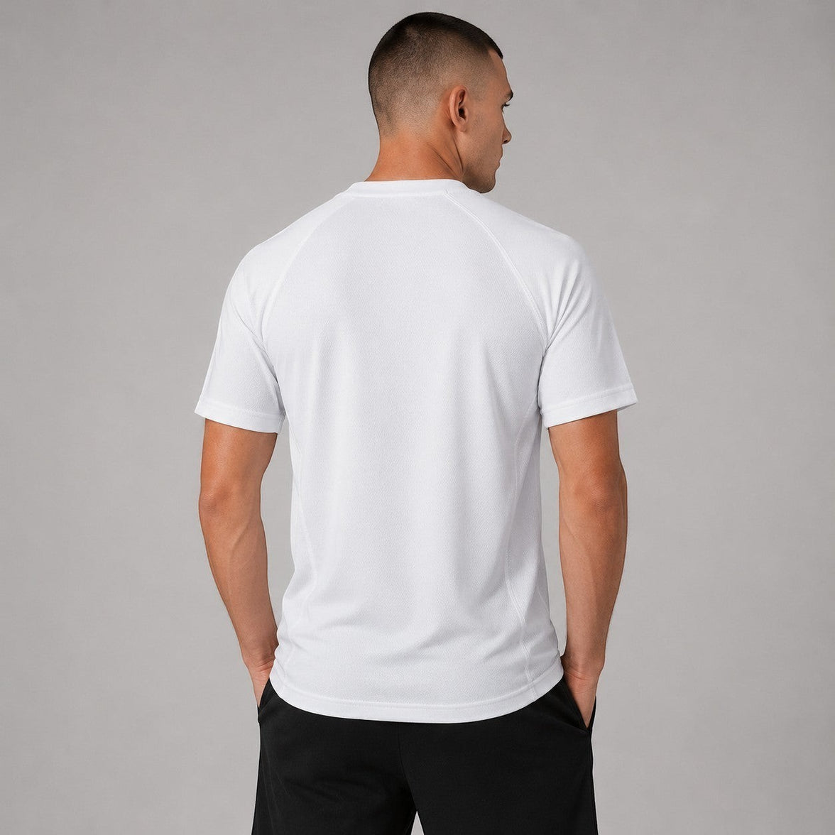 TwentyTenCollective white athletic t-shirt with crew neck and short sleeves, made from breathable fabric.