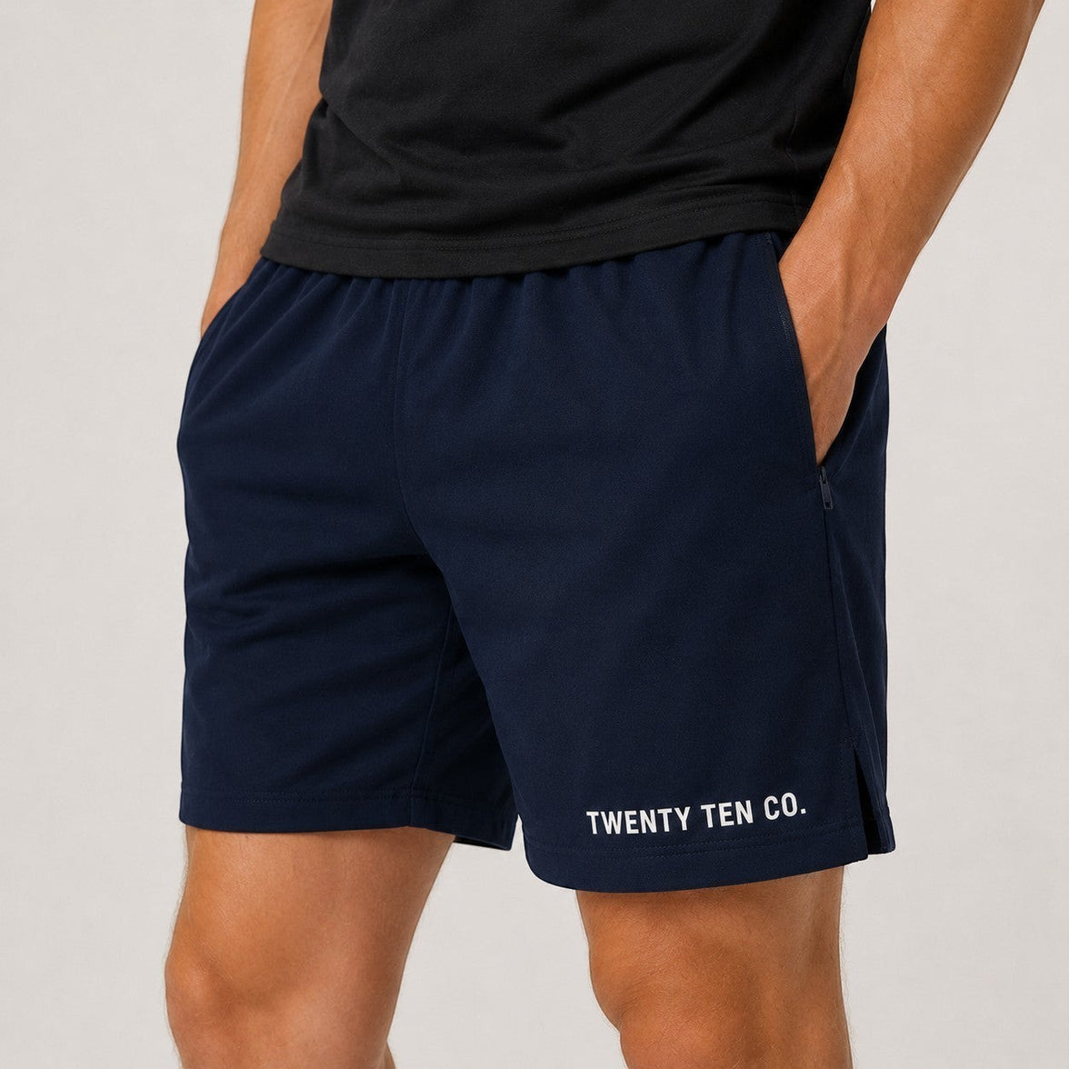 TwentyTenCo. navy blue athletic shorts for men, cotton blend with elastic waistband, drawstring, side pockets, and zippered pocket.