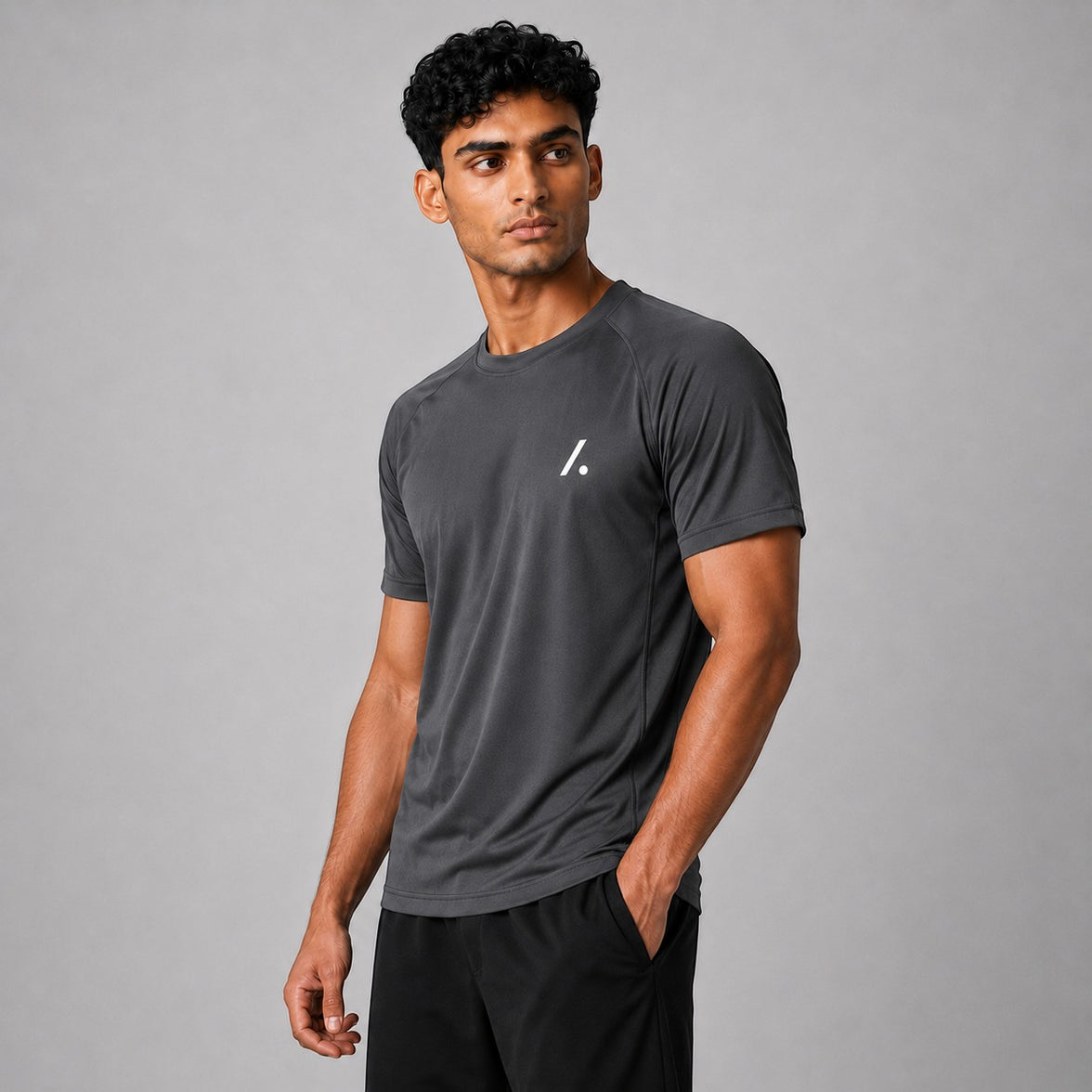 TwentyTenCollective Performance Athletic T-Shirt in grey, featuring a minimalist white logo on the chest. Designed for activewear.